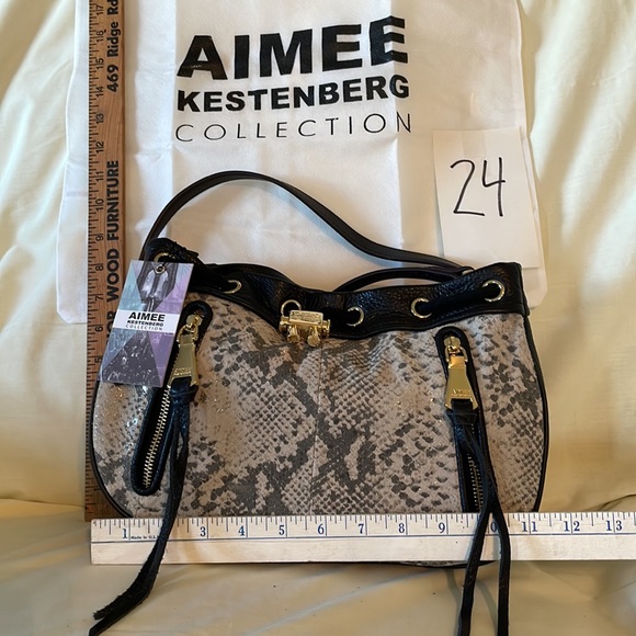 Aimee Kestenberg Handbags - Brand new Aimee Kestenberg Mini Pebble Leather Drawstring Purse (Sasha)